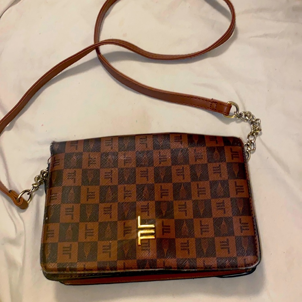 Small brown crossbody bag.